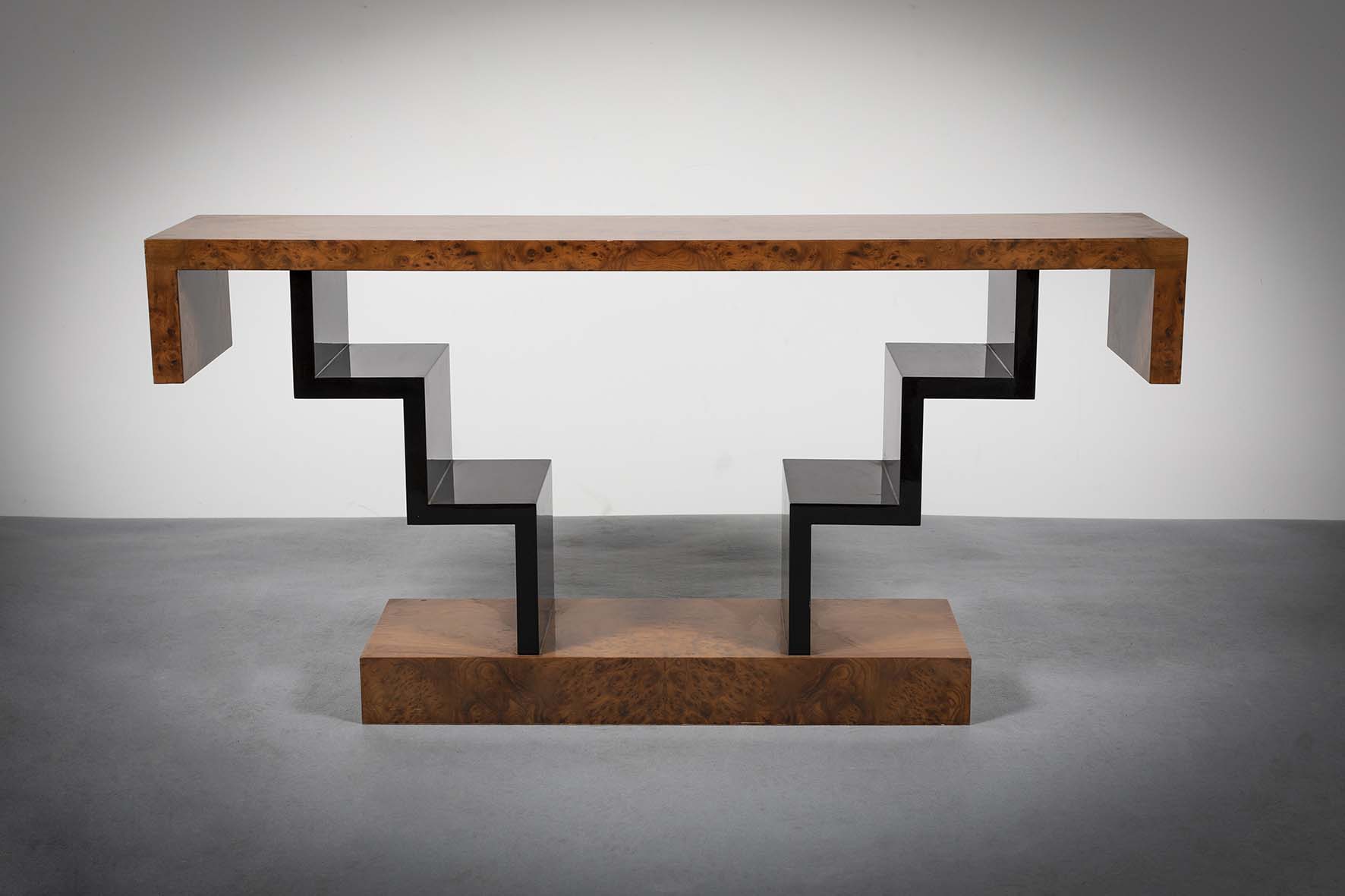 A LACQUERED WALNUT CONSOLE TABLE, IN ART DECO STYLE, of angular form, on plinth base, 140cm (h) x