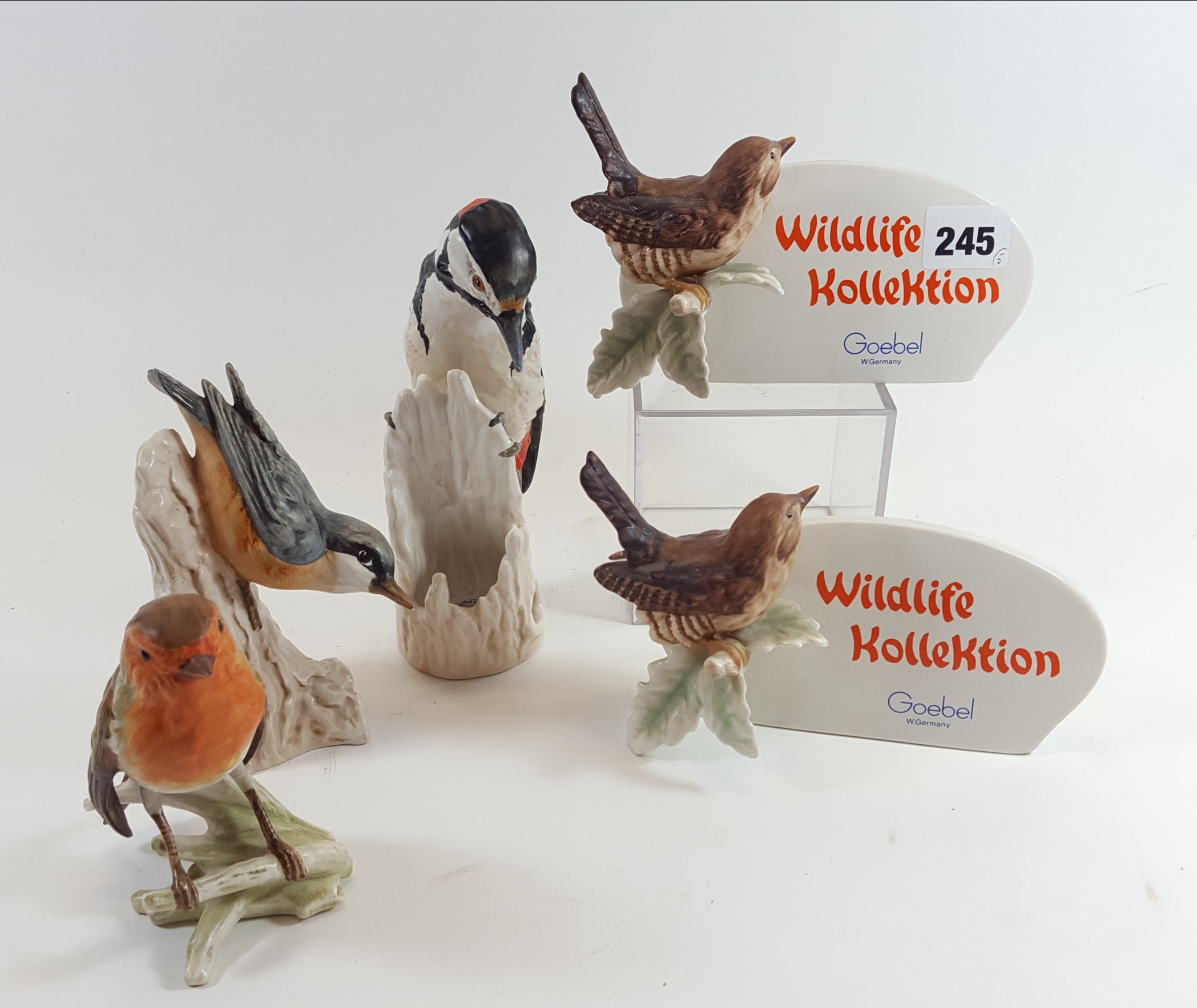 TWO GOEBEL BIRD ADORNED "WILDLIFE KOLLEKTION" PLAQUES, a Goebel WOODPECKER, 7 ins high,