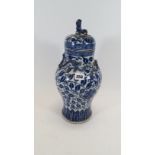 A 19TH CENTURY CHINESE BLUE AND WHITE UNDERGLAZE PORCELAIN VASE decorated with meandering foliage