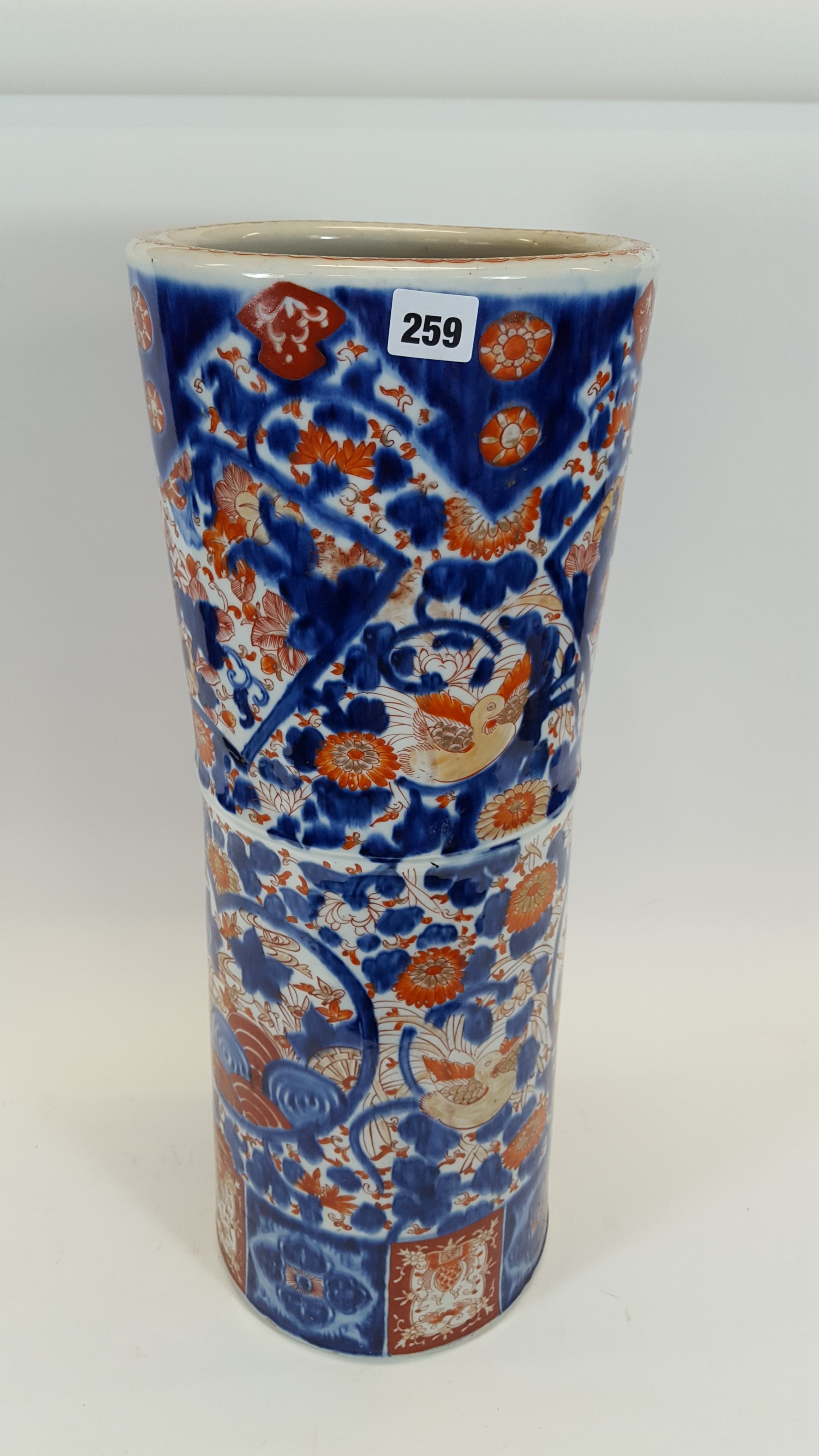 A LARGE LATE 19TH CENTURY JAPANESE IMARI PORCELAIN STICK STAND of cylindrical form with all over