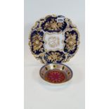 A LATE 19TH CENTURY MEISSEN BLUE/WHITE GROUND PORCELAIN PLATE with moulded floral gilt decoration,