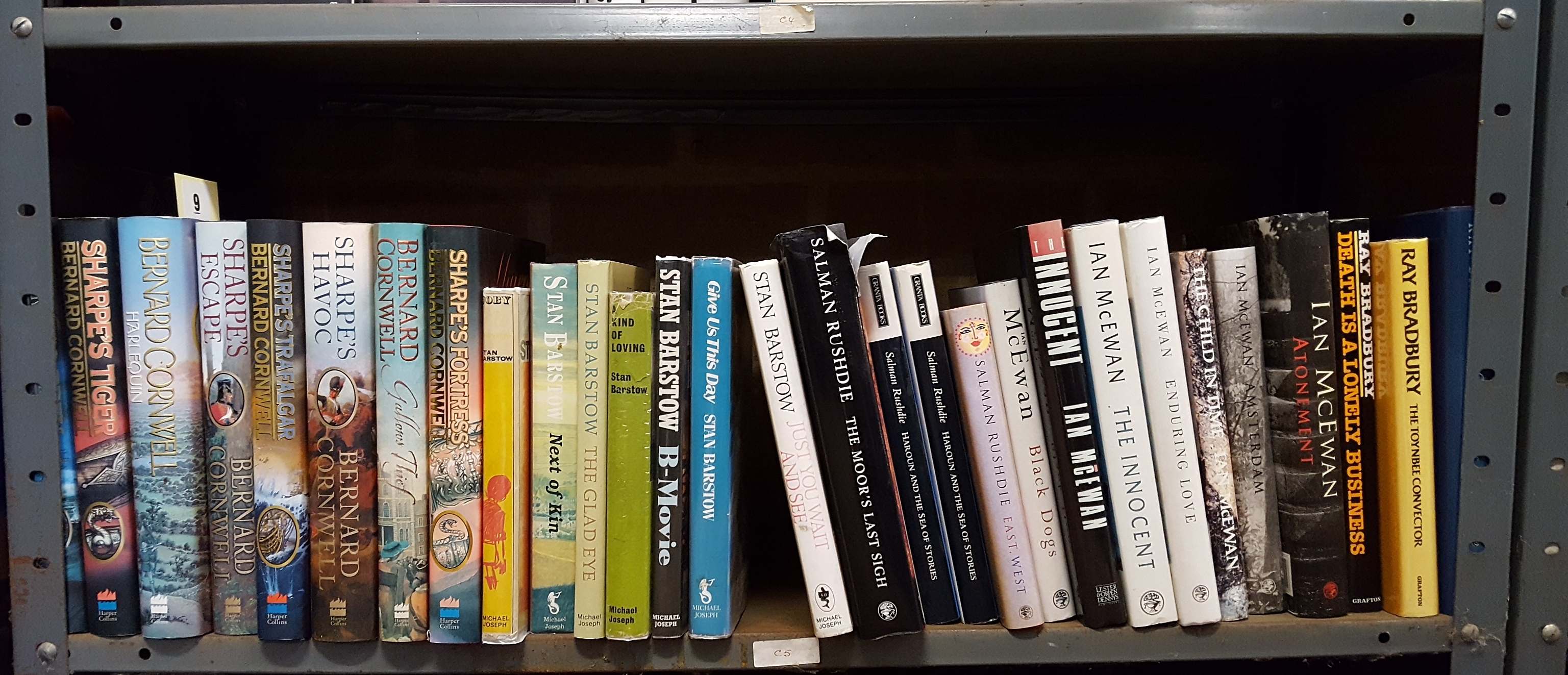 BERNARD CORNWALL (8), BARSTOW, MCEWAN, SALMAN RUSHDIE, one shelf.