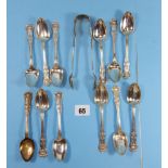 A SET OF TWELVE VICTORIAN SILVER FOLIATE PATTERN TEASPOONS AND MATCHING SUGAR TONGS, maker:- M & A,