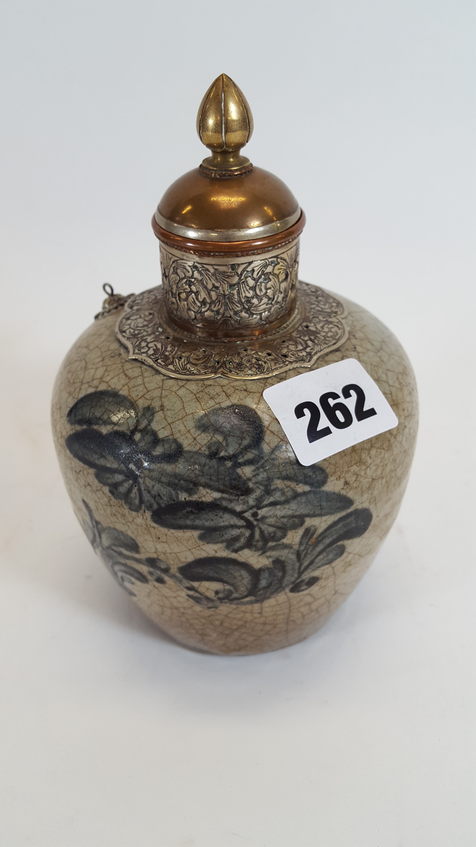 AN UNUSUAL ANTIQUE CHINESE CRACKLE WARE VASE with elaborate floral metal collar, neck and cover,