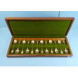 A SET OF TWELVE HALLMARKED SILVER "ROYAL HORTICULTURAL SOCIETY" flower terminal SPOONS, boxed,