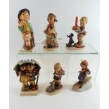 A LARGE GOEBEL HUMMEL FIGURE, children under and umbrella, 6 1/2 ins high,