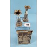 A PAIR OF LATE VICTORIAN SILVER VASES with flared rims and foliate bases, Birmingham 1899,