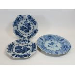 A PAIR OF 18TH CENTURY ENGLISH BLUE AND WHITE OCTAGONAL TIN-GLAZED DELFT PLATES decorated in the