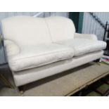 A Howard style two seater sofa CONDITION: Please Note - we do not make reference to