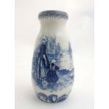 A circa 19th C Royal Bonn ''Delft'' blue and white vase depicting a Dutch mother and daughter