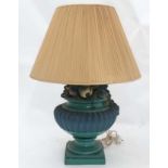 A green fruit moulded table lamp decorated with grape vine/ivy deisgn CONDITION: