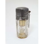 A cut glass atomizer bottle with silver plate screw top 4 1/4" high CONDITION: