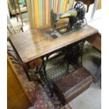 A 1930s 'Singer' sewing machine with integral cast iron base CONDITION: Please Note