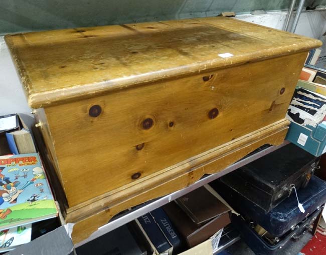A pine chest/blanket box CONDITION: Please Note - we do not make reference to the