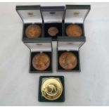 6 x cased medallions to include examples by the Tower Mint depicting Sheila and Richard