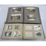 Books : One early 20thC postcard albums and one photograph album of British seaside towns .