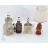 A collection of 4 retro lamps to include 3 pottery examples and 1 wooden (4) CONDITION: