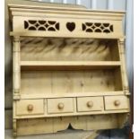 A pine plate rack with four drawers and hangers CONDITION: Please Note - we do not