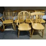 6 pine modern dining chairs to include two wheel back carvers (4+2) CONDITION: