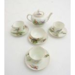 A miniature 19thC transfer printed tea set,