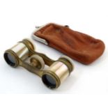Opera glasses : A small pair of adjustable opera glasses with mother of pearl decoration.. Cased.