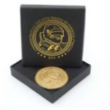 Formula 1 : A Commemorative medallion ' Commemorating the 65th Season of Formula 1 Racing.