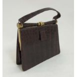 A vintage crocodile effect leather brown ladies single handle handbag,
