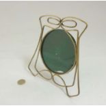 Decorative Metalware : An Art Deco brass circular glazed strut / easel back photograph frame.