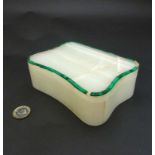 An Art Deco white onyx and malachite serpentine shaped hinged lidded box with Betjemann's patent