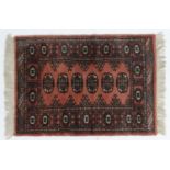 Rug/carpet : a hand made prayer rug with 6 Geometric on salmon pink ,ground with yellow , white ,