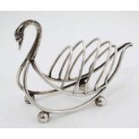 A novelty silver plate toast rack formed as a swan.