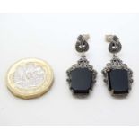 A pair of silver drop earrings set with onyx and marcasite 1 1/2" long CONDITION: