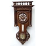 French Walnut Wall Compendium : the walnut case with clock,
