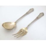A French silver fork and spoon with gilded bowl 5 3/4" long overall,