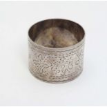 A silver napkin ring with engraved decoration hallmarked Sheffield 1901 maker Allen & Darwin (30g)