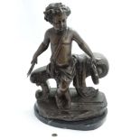 A large bronzed figure of a classical cherub like boy with tambourines, on a marble base.