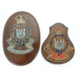 Militaria : A cast and painted Wall Plaque bearing the insignia of the Royal Army Ordnance Corps (