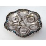 A small silver dish with champleve enamel decoration. Marked under 1000.