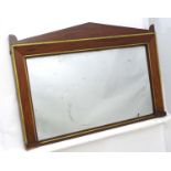 A Regency mahogany and gilt over mantle mirror.