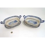 A pair of early 19th C blue and white pearlware chestnut baskets with stands,
