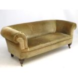 A late 19thC Chesterfield sofa, manner of Morris,