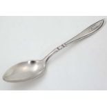 A silver spoon hallmarked Birmingham 1925 maker Docker & Burn Ltd.