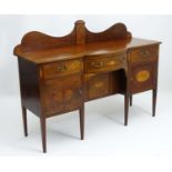 A George III mahogany Sideboard with intricate marquetry decoration throughout,