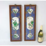 A pair of Chinese blue ceramic panels with gilt lotus foliate decoration and famille verte
