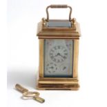Porcelain panel carriage Clock : a brass cased Carriage timepiece with bevelled glass top and