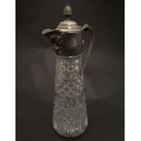 A glass claret jug with silver plate handle and mounts 11 1/2" high overall CONDITION: