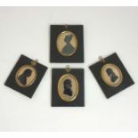 19 th C Silhouettes : Four oval silhouettes , some highlighted ,