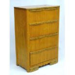 Mid Century Modern : an early to mid century blonde mahogany ? Chest of drawers with cupids bow