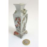 A small square Chinese vase on 4 footed base, depicting cockerels amidst cherry blossoms,