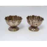 A pair of silver small pedestal dishes hallmarked Birmingham 1918 maker S Blanckensee & Son Ltd.